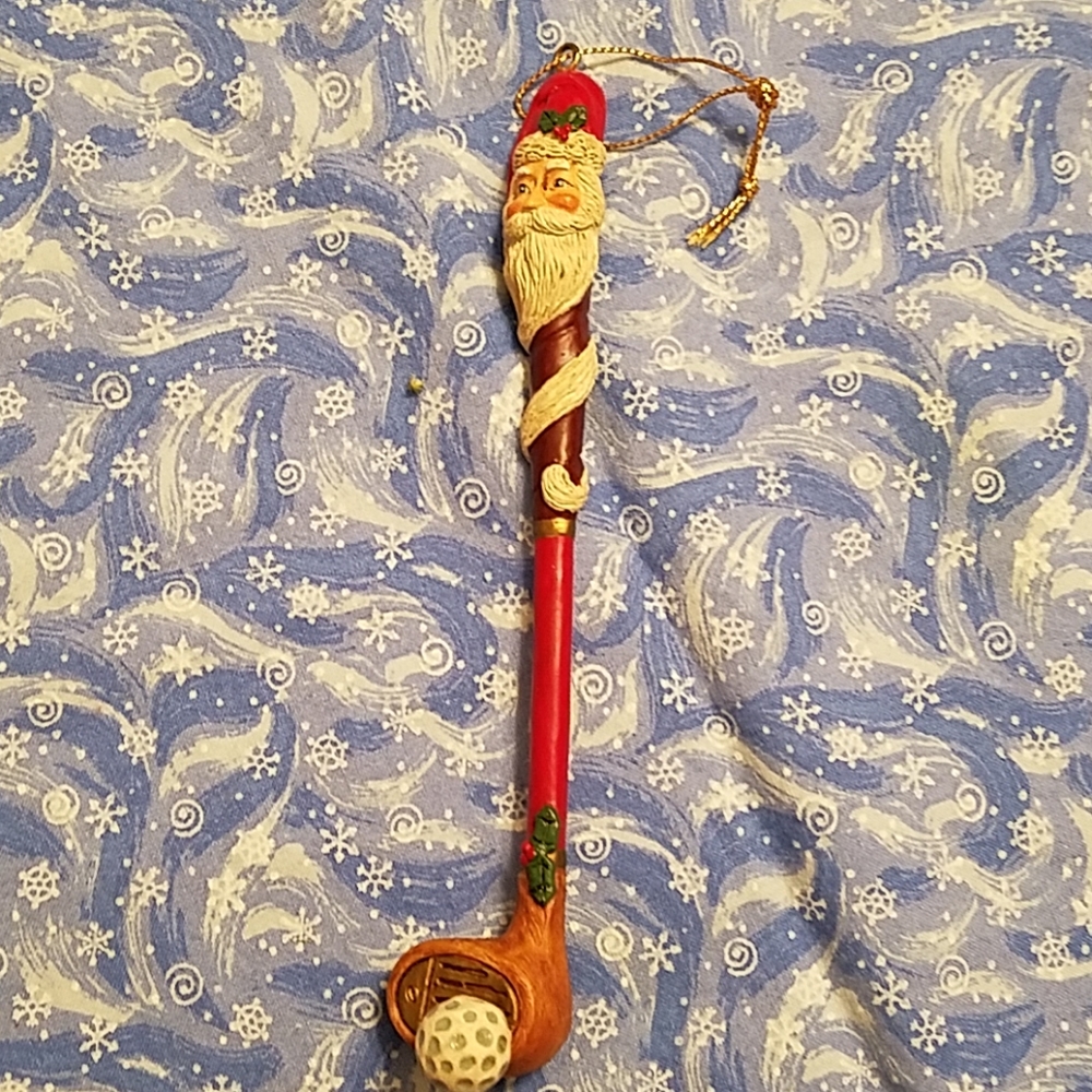 Santa Golf club w/golf ball ornament.